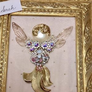 Angel, Sarah, has so much movement in her. Done in gold and pearl.